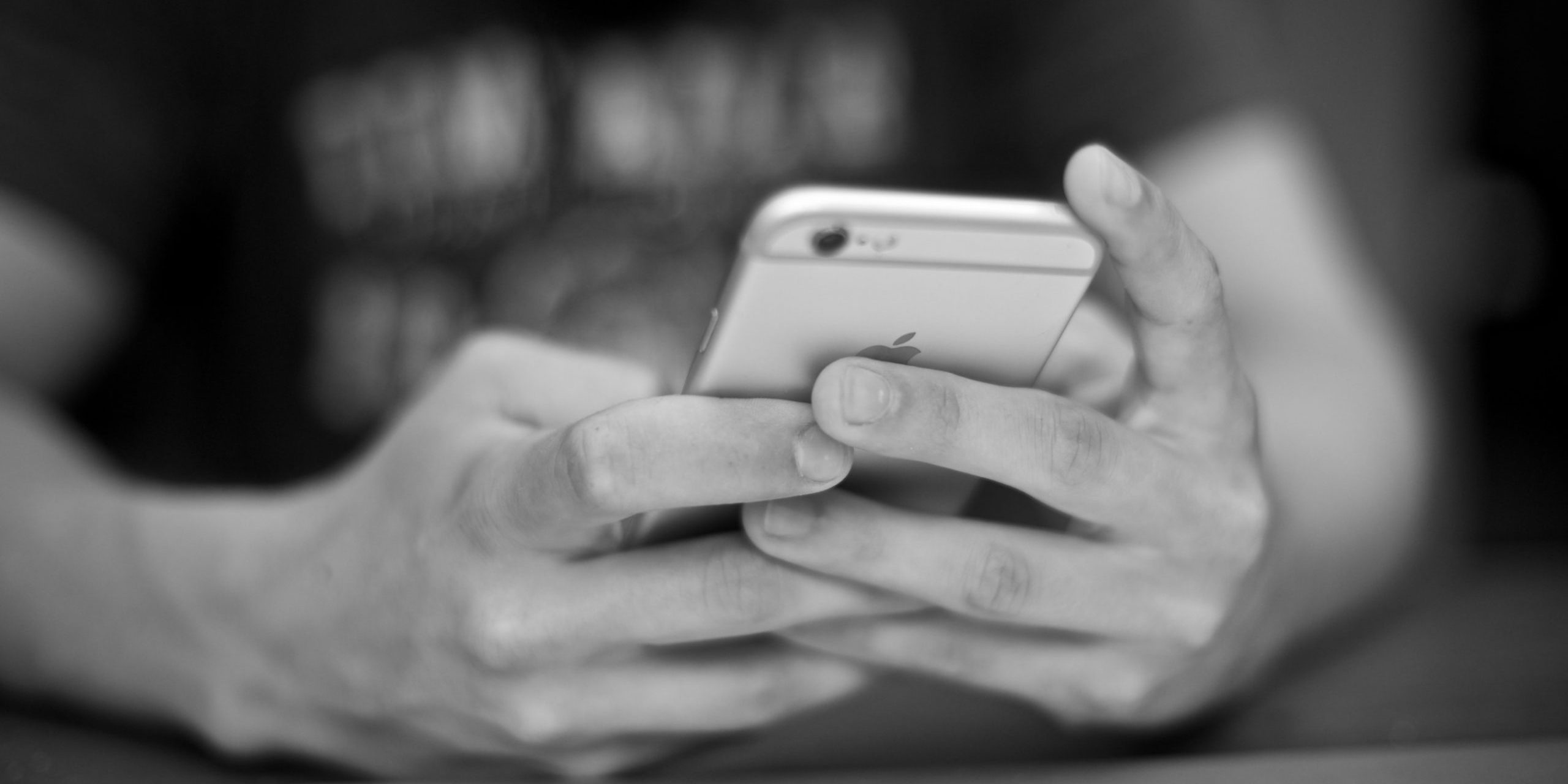 Adolescent texting on phone